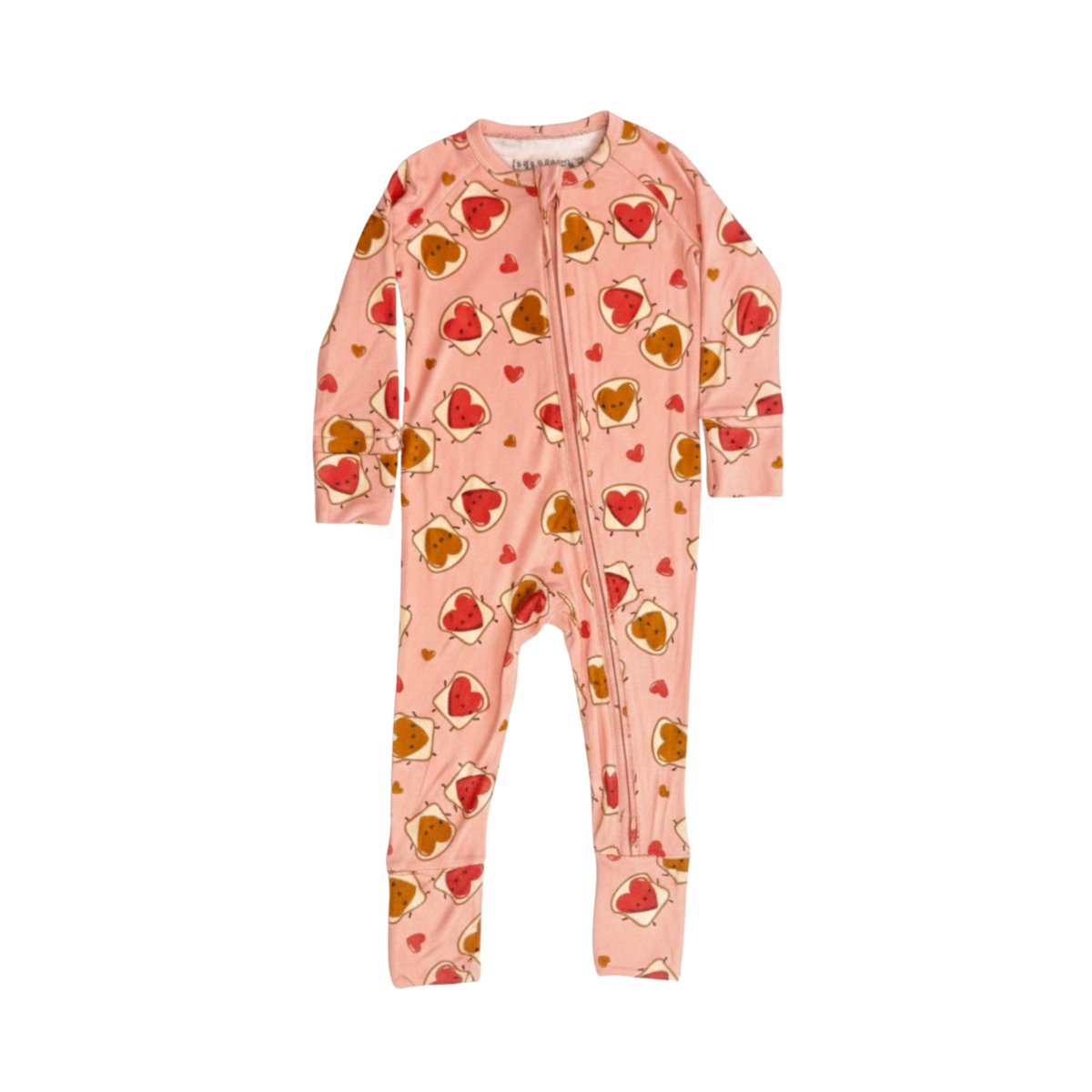 Pink baby onesie with heart pattern on a pink background