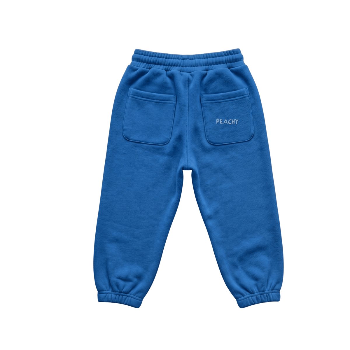 Blue sweatpants shown from the back, featuring an elastic waistband, two back pockets, and the word 'PEACHY' embroidered in white on the right pocket, set against a plain white background.
